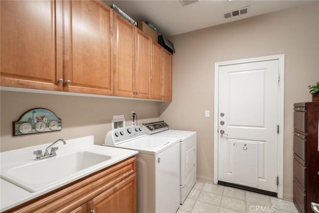 42432 72nd St W, Lancaster, CA 93536 - laundry area featuring washing machine and clothes dryer and cabinet space