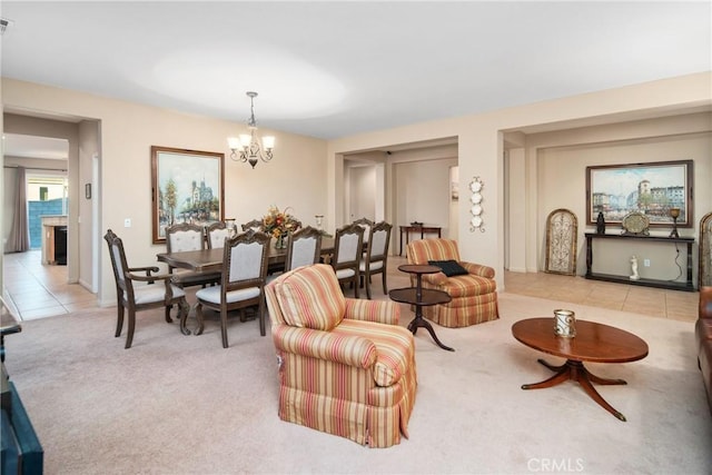 42432 72nd St W, Lancaster, CA 93536 - carpeted living room featuring a chandelier and tile patterned floors