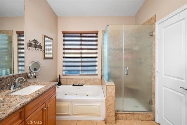 42432 72nd St W, Lancaster, CA 93536 - bathroom featuring a shower stall, vanity, a jetted tub, and tile patterned floors