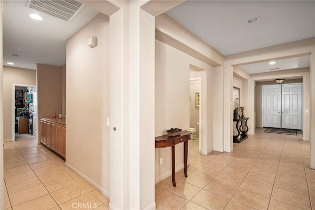 42432 72nd St W, Lancaster, CA 93536 - hallway with light tile patterned floors and recessed lighting