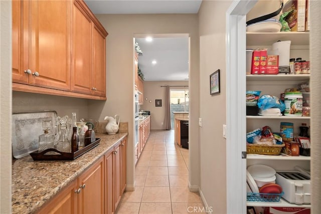 42432 72nd St W, Lancaster, CA 93536 - bar area featuring light tile patterned flooring, recessed lighting, and stainless steel oven