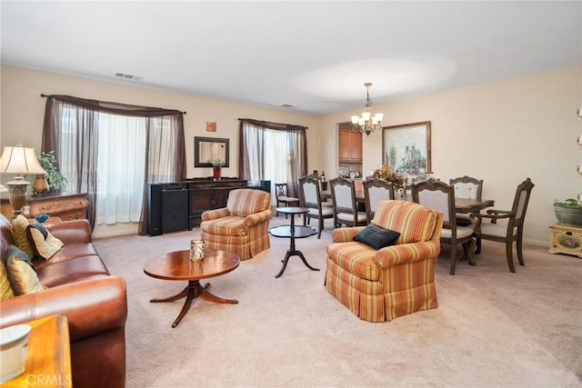 42432 72nd St W, Lancaster, CA 93536 - living room featuring a chandelier and light carpet
