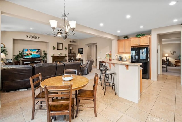 42432 72nd St W, Lancaster, CA 93536 - dining area featuring a chandelier, light tile patterned floors, and recessed lighting