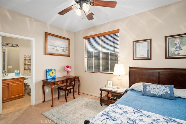 42432 72nd St W, Lancaster, CA 93536 - bedroom with light carpet, ensuite bath, ceiling fan, and light tile patterned flooring