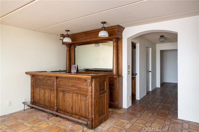 809 Via Lido Soud, Newport Beach, CA 92663 - indoor wet bar with arched walkways and decorative light fixtures