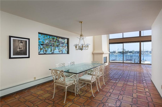 809 Via Lido Soud, Newport Beach, CA 92663 - dining area featuring a baseboard heating unit, a chandelier, and tile patterned flooring