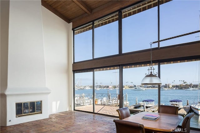 809 Via Lido Soud, Newport Beach, CA 92663 - dining space with high vaulted ceiling, a water view, and a wood ceiling with exposed beams