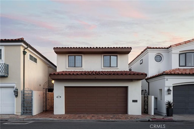 809 Via Lido Soud, Newport Beach, CA 92663 - mediterranean / spanish home with stucco siding, a garage, and a tile roof