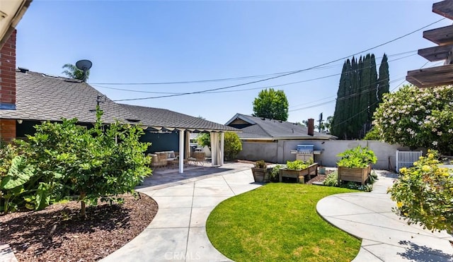 2119 E Denise Ave, Orange, CA 92867 - view of yard with a vegetable garden and a patio area