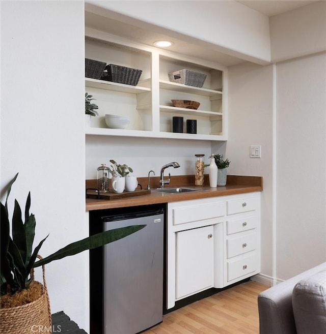 2119 E Denise Ave, Orange, CA 92867 - indoor wet bar featuring dishwasher and light wood-style floors