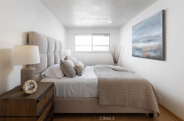 2119 E Denise Ave, Orange, CA 92867 - bedroom featuring a textured ceiling, wood finished floors, and recessed lighting