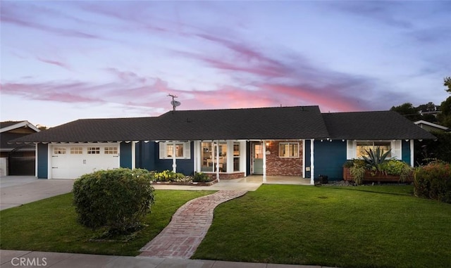 2119 E Denise Ave, Orange, CA 92867 - ranch-style house with an attached garage, driveway, and a lawn