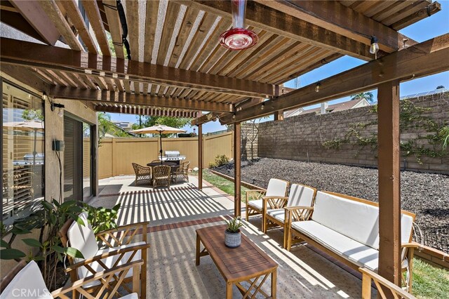 990 La Paz Rd Unit 49, Placentia, CA 92870 - fenced backyard with a patio area, a pergola, and outdoor dining space