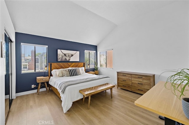 990 La Paz Rd Unit 49, Placentia, CA 92870 - bedroom with wood finished floors and vaulted ceiling