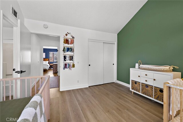 990 La Paz Rd Unit 49, Placentia, CA 92870 - bedroom with wood finished floors and a closet