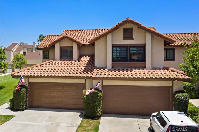 990 La Paz Rd Unit 49, Placentia, CA 92870 - mediterranean / spanish-style home with driveway and stucco siding