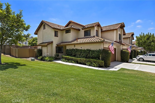 990 La Paz Rd Unit 49, Placentia, CA 92870 - mediterranean / spanish-style house featuring concrete driveway, stucco siding, a tiled roof, and a garage