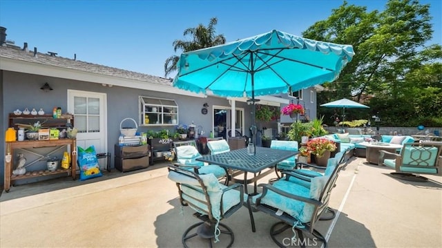 8356 Bella Vista Dr, Rancho Cucamonga, CA 91701 - view of patio / terrace featuring an outdoor living space with a fire pit and outdoor dining area