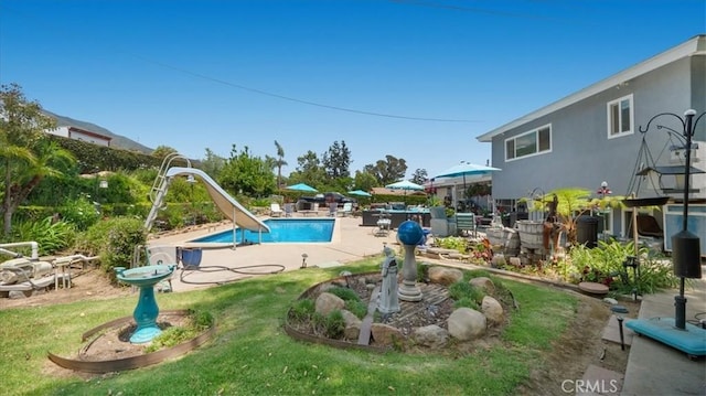 8356 Bella Vista Dr, Rancho Cucamonga, CA 91701 - swimming pool with a water slide and a patio