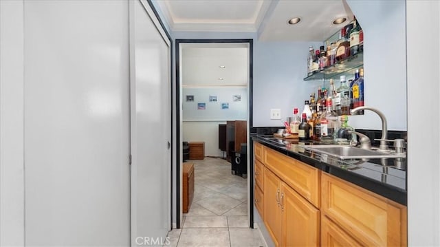 8356 Bella Vista Dr, Rancho Cucamonga, CA 91701 - indoor wet bar featuring light tile patterned floors and a raised ceiling