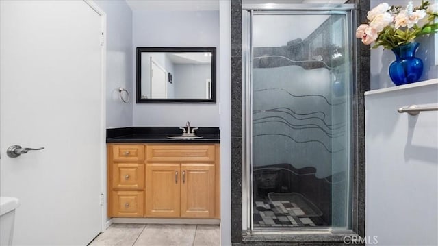 8356 Bella Vista Dr, Rancho Cucamonga, CA 91701 - full bathroom featuring a stall shower, vanity, and tile patterned flooring