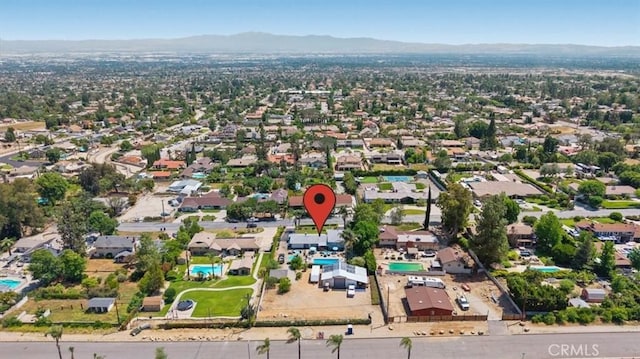 8356 Bella Vista Dr, Rancho Cucamonga, CA 91701 - aerial view of property and surrounding area featuring a mountain backdrop and nearby suburban area