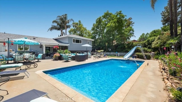 8356 Bella Vista Dr, Rancho Cucamonga, CA 91701 - swimming pool featuring an outdoor living space, a water slide, and a patio area
