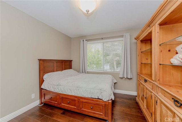 6242 E Inverness Pl, Orange, CA 92869 - bedroom with baseboards and dark wood-style floors