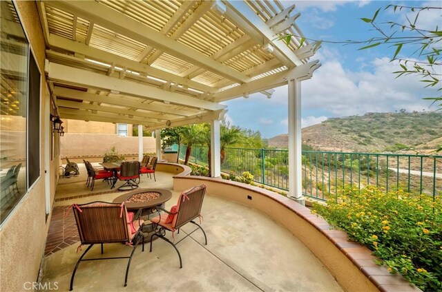 6242 E Inverness Pl, Orange, CA 92869 - view of patio featuring a mountain view and a pergola