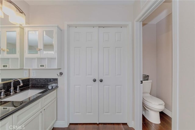 6242 E Inverness Pl, Orange, CA 92869 - bar area featuring a sink and dark wood finished floors