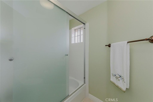 6242 E Inverness Pl, Orange, CA 92869 - full bath featuring bath / shower combo with glass door and baseboards