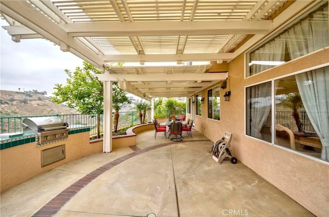 6242 E Inverness Pl, Orange, CA 92869 - view of patio with outdoor dining space, exterior kitchen, and a pergola