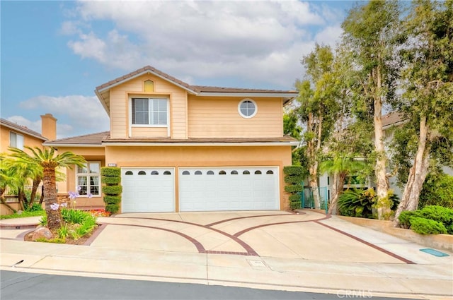 6242 E Inverness Pl, Orange, CA 92869 - traditional-style house with an attached garage and driveway