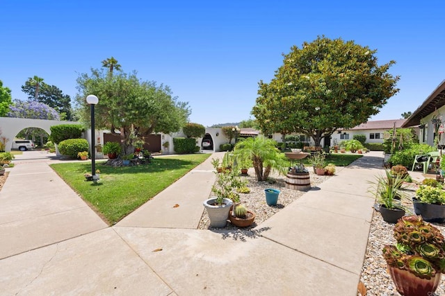 16566 Caminito Vecinos Unit 31, San Diego, CA 92128 - view of front of house featuring a front lawn