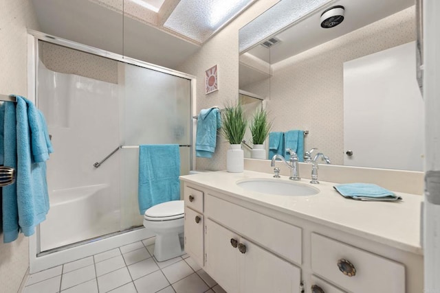 16566 Caminito Vecinos Unit 31, San Diego, CA 92128 - full bath with tile patterned floors, a stall shower, and vanity
