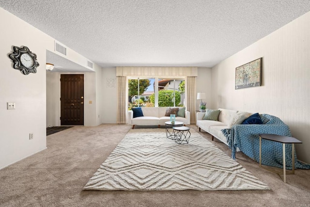 16566 Caminito Vecinos Unit 31, San Diego, CA 92128 - carpeted living room with a textured ceiling