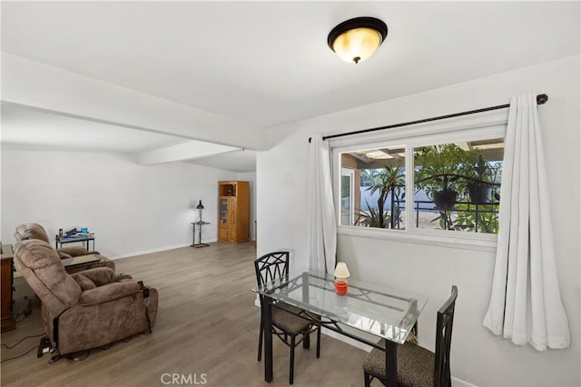 4657 Chateau Pl, San Diego, CA 92117 - dining space with light wood-style flooring and baseboards