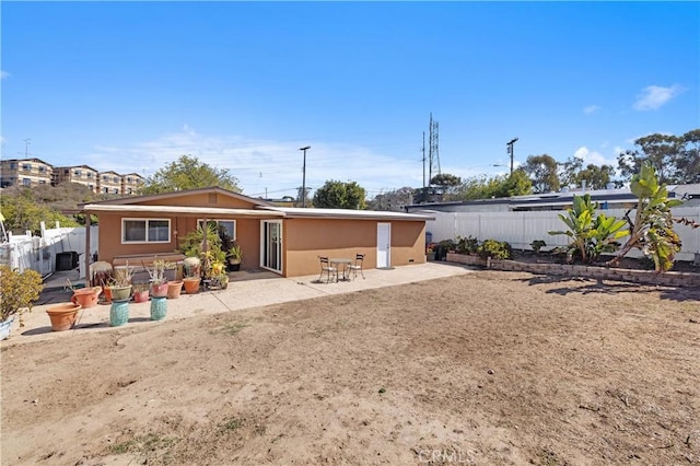 4657 Chateau Pl, San Diego, CA 92117 - rear view of house with a patio area, a fenced backyard, and stucco siding