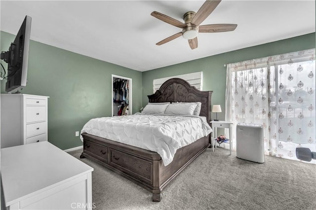 21304 Carriage Dr, Tehachapi, CA 93561 - bedroom with carpet, a ceiling fan, a closet, and a walk in closet