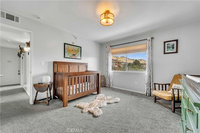 21304 Carriage Dr, Tehachapi, CA 93561 - carpeted bedroom with baseboards and a nursery area