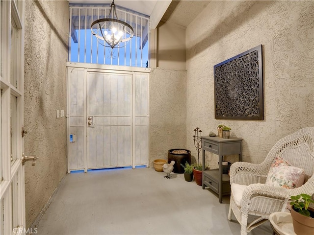 21829 Legend Ave, Carson, CA 90745 - entrance foyer with a chandelier and concrete flooring