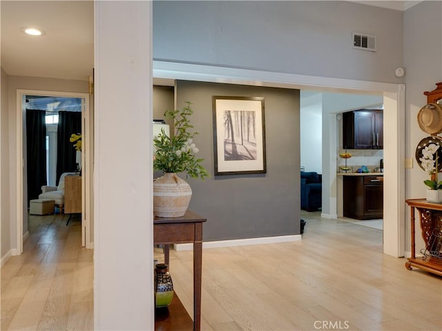 21829 Legend Ave, Carson, CA 90745 - corridor with light wood finished floors and recessed lighting