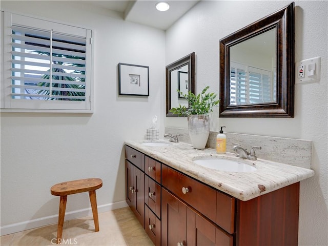 21829 Legend Ave, Carson, CA 90745 - bathroom with double vanity and baseboards