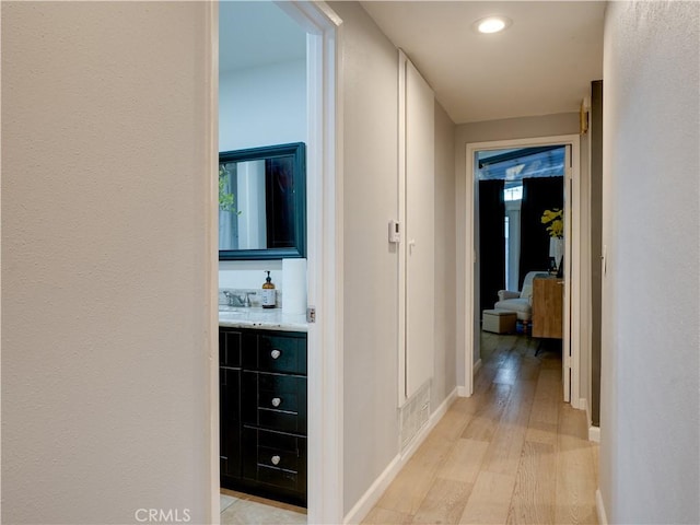 21829 Legend Ave, Carson, CA 90745 - hall with light wood-style floors and recessed lighting