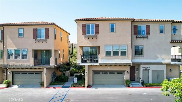 18309 Goldbark Way, Yorba Linda, CA 92886 - view of front of house featuring stucco siding, an attached garage, and concrete driveway