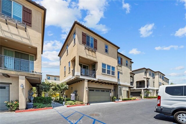 18309 Goldbark Way, Yorba Linda, CA 92886 - view of building exterior with a residential view and a garage