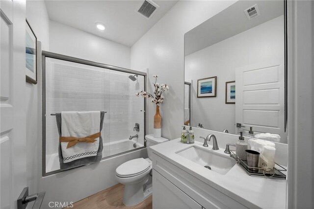 18309 Goldbark Way, Yorba Linda, CA 92886 - bathroom with vanity, wood finished floors, and enclosed tub / shower combo
