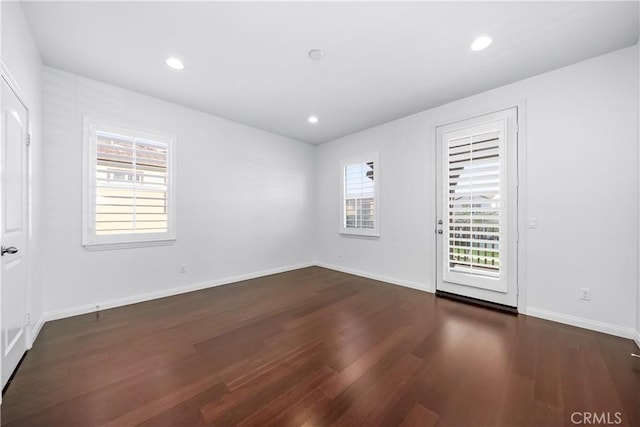 15448 Six M Ranch Ln, Fontana, CA 92336 - empty room featuring healthy amount of natural light, wood finished floors, and recessed lighting