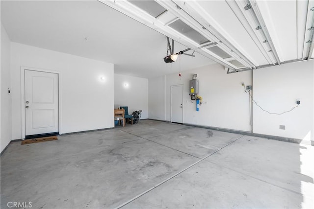 15448 Six M Ranch Ln, Fontana, CA 92336 - garage with a garage door opener and water heater
