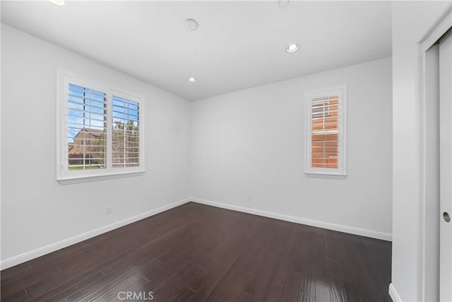 15448 Six M Ranch Ln, Fontana, CA 92336 - unfurnished room with dark wood-style flooring and recessed lighting